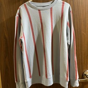 Blue sweatshirt with red strips